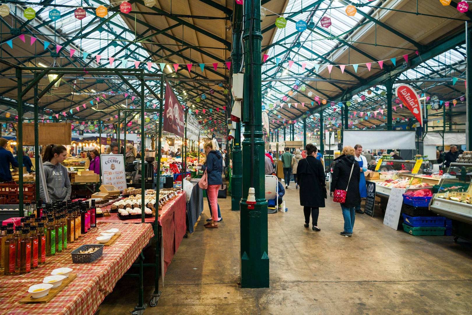 Independent food stalls inside St George's Market in Belfast